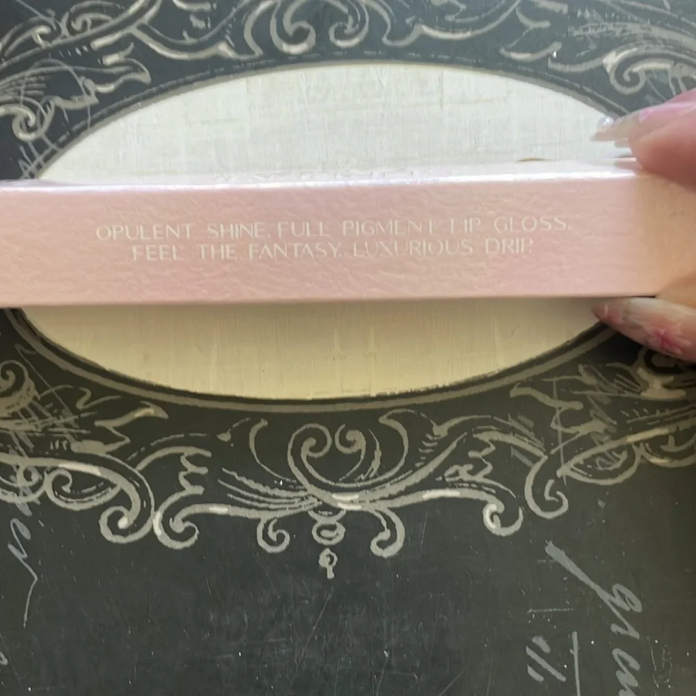 Jeffree Star cosmetics SUPREME GLOSS in the color Weirdo black